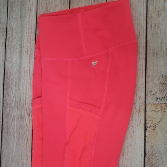 Fabletics On-the-Go High-Waisted Capri in Pop Coral - Picture 7 of 12